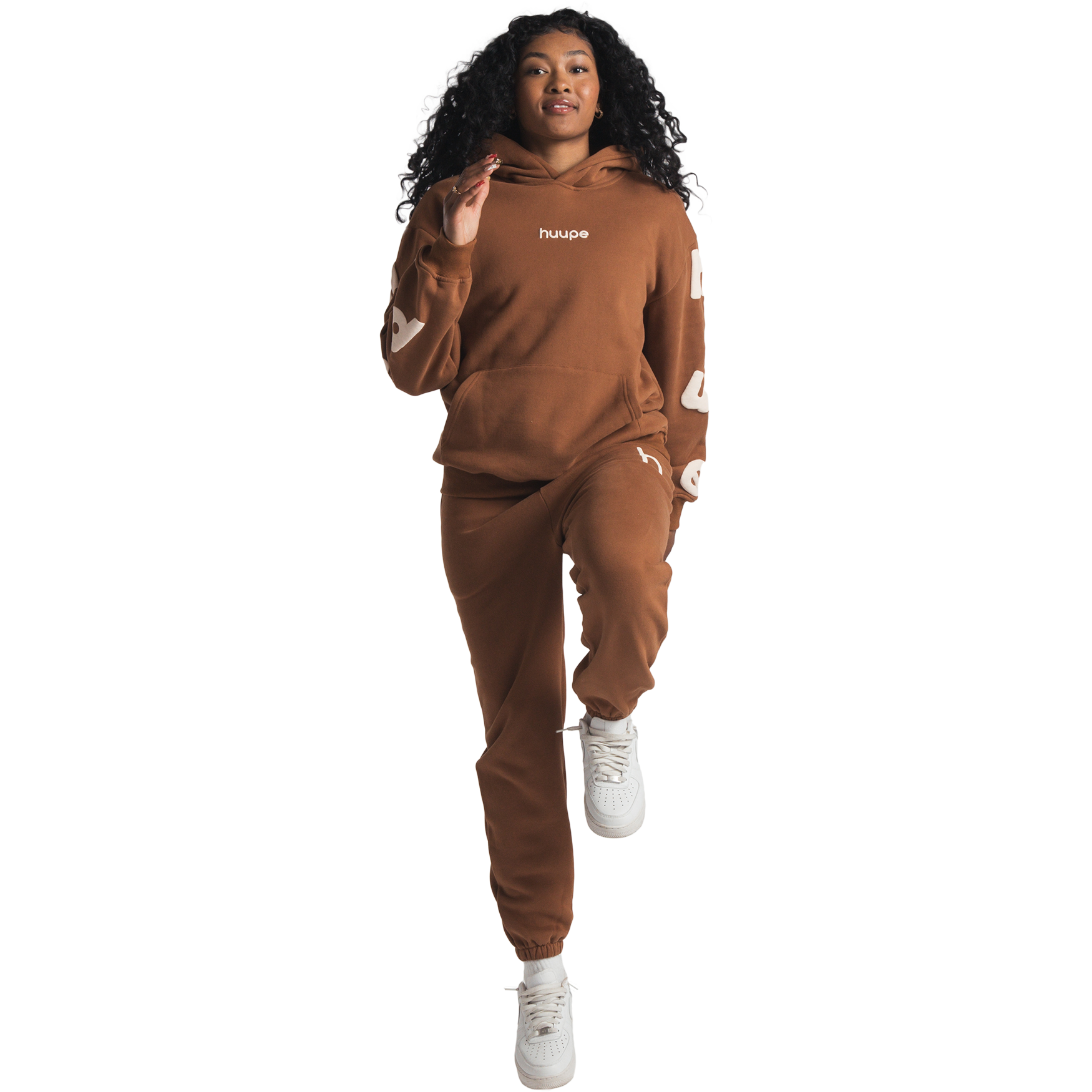 woman wearing brown huupe sweats